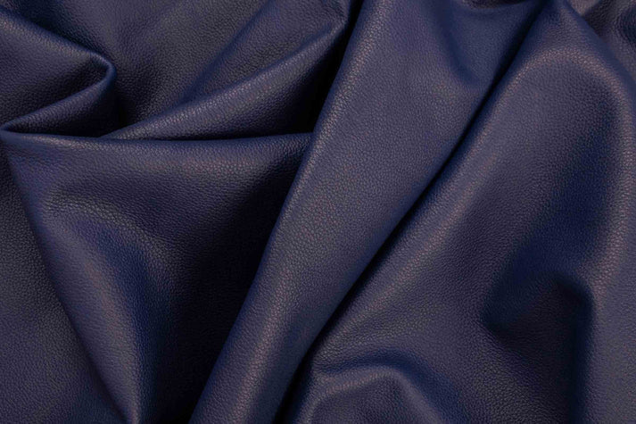 Piel color vino azul marino texturizado grabado